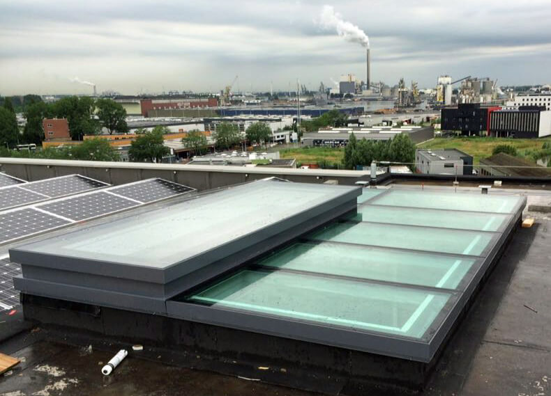 Glass roof with Skydoor roof hatch acces on Superloft Amsterdam